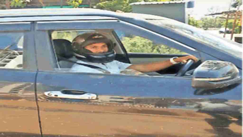 रेवाड़ी में अजीब कारनामा: ये शख्स हेलमेट पहनकर ड्राइव करता है कार, इस घटना ने बदल दी जिंदगी Rewari Helmet Man